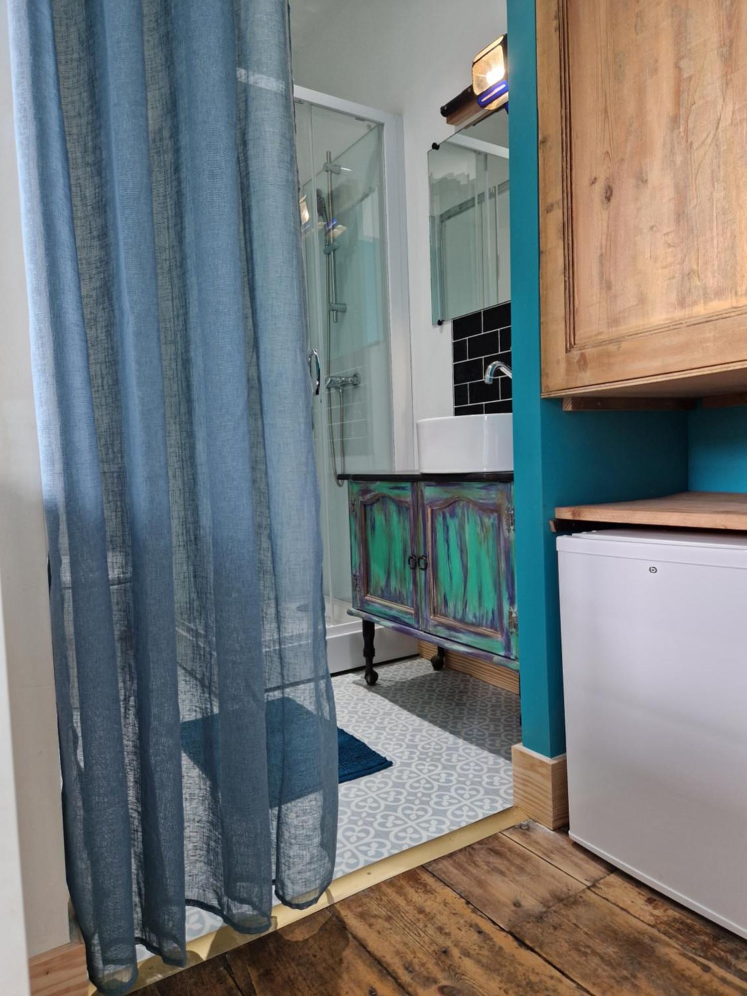 Quarto em Acomodações Particulares Le Jardin Aux Camelias *